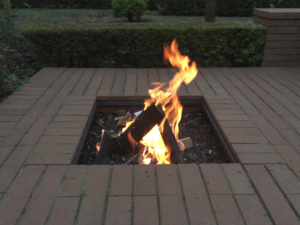 fire pit with pavers and brick