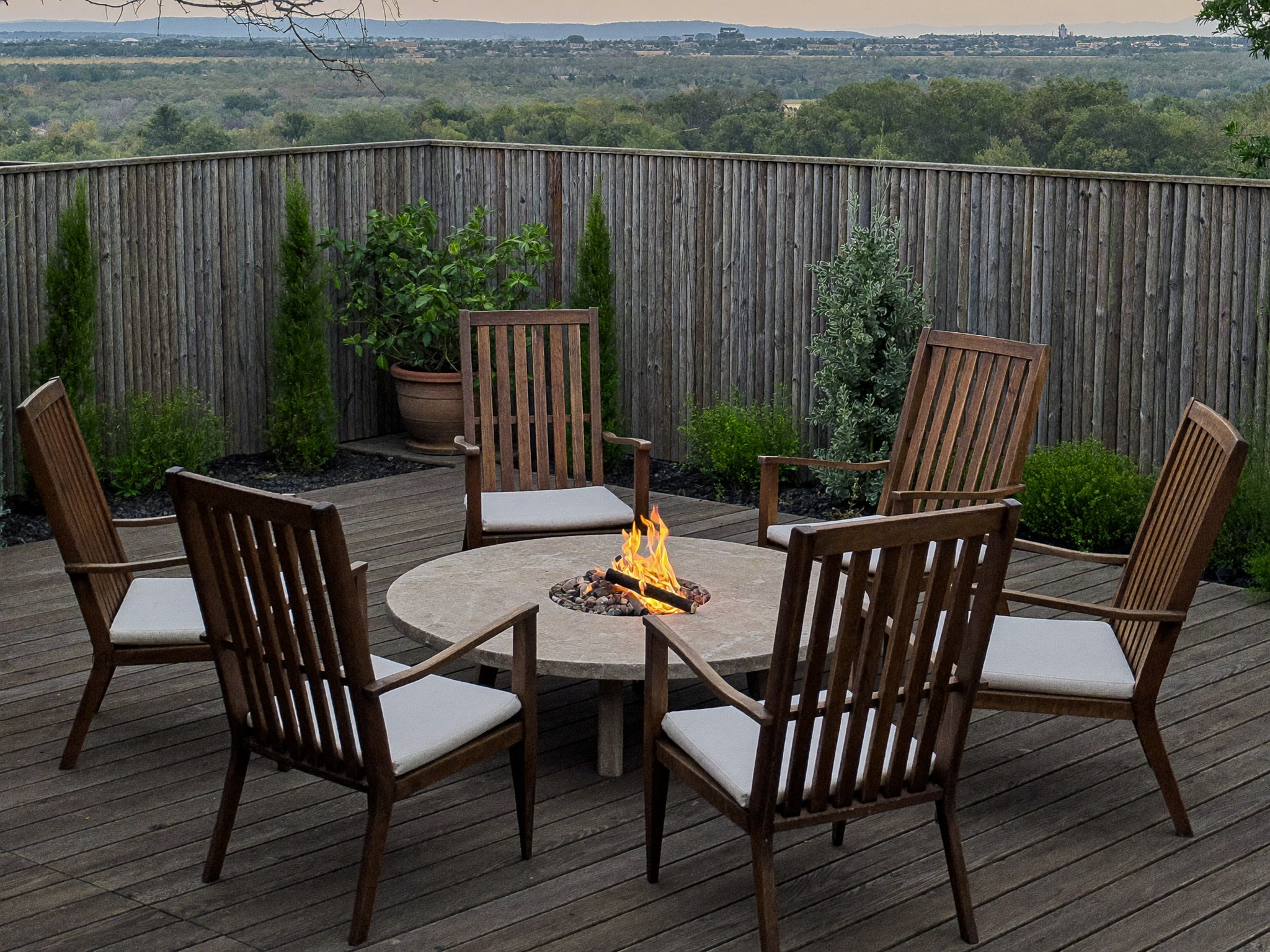 Outdoor seating arranged around a patio fire pit